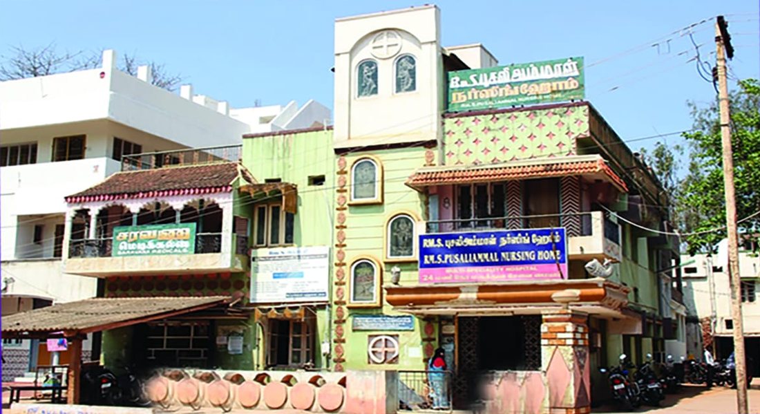 The original Rm.S. Pusaliammal Nursing Home premises in Singampunari, with its early Tamil and English signboards